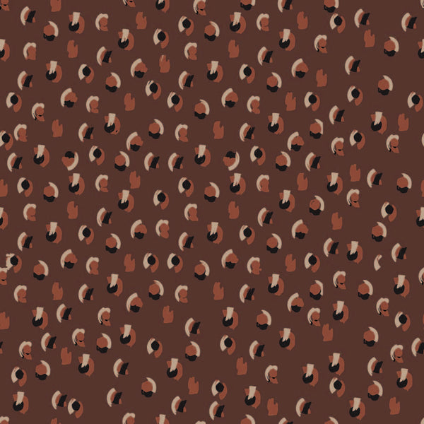 burgandy_A Bowen wallpaper by Wall Snobs features a burgundy geometric pattern with subtle animal-print inspiration, creating a layered and textural wallcovering. Featured in the RUE Magazine Showhouse in Dallas, Texas.