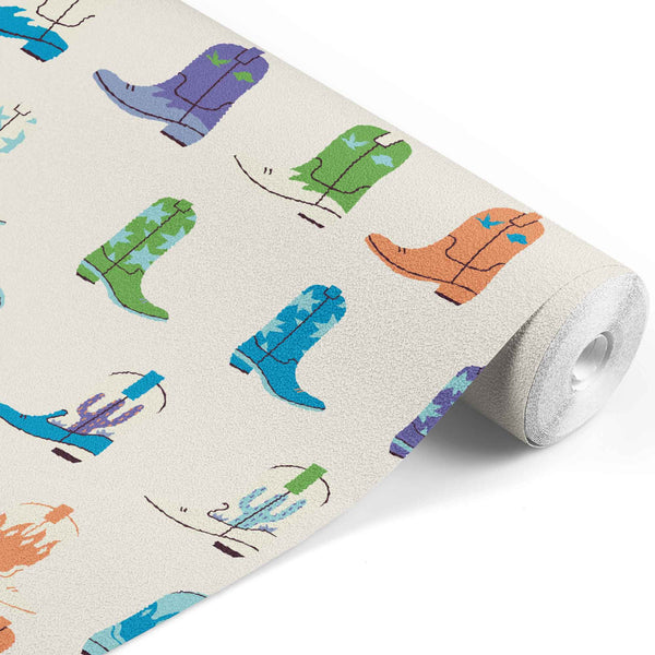 cream_wallpaper with a pattern of colorful cartoon cowboy boots.