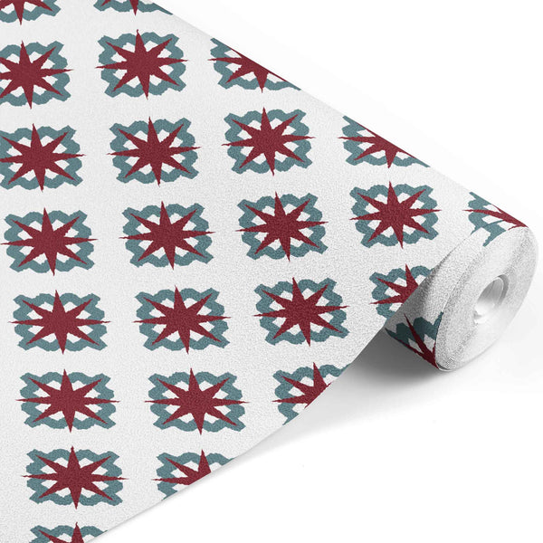 white_A roll of wallpaper with a geometric pattern featuring red and teal-colored shapes on a white background.
