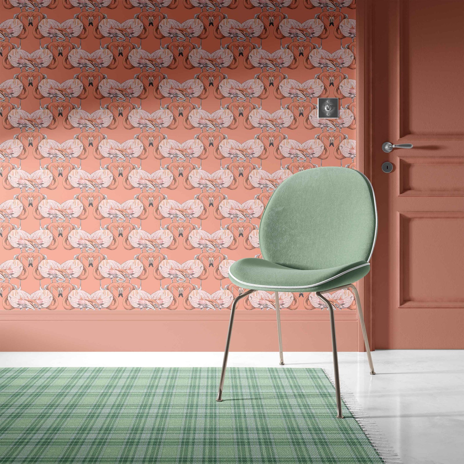 salmon_Green chair in front of a wall with pink wallpaper featuring animal patterns.