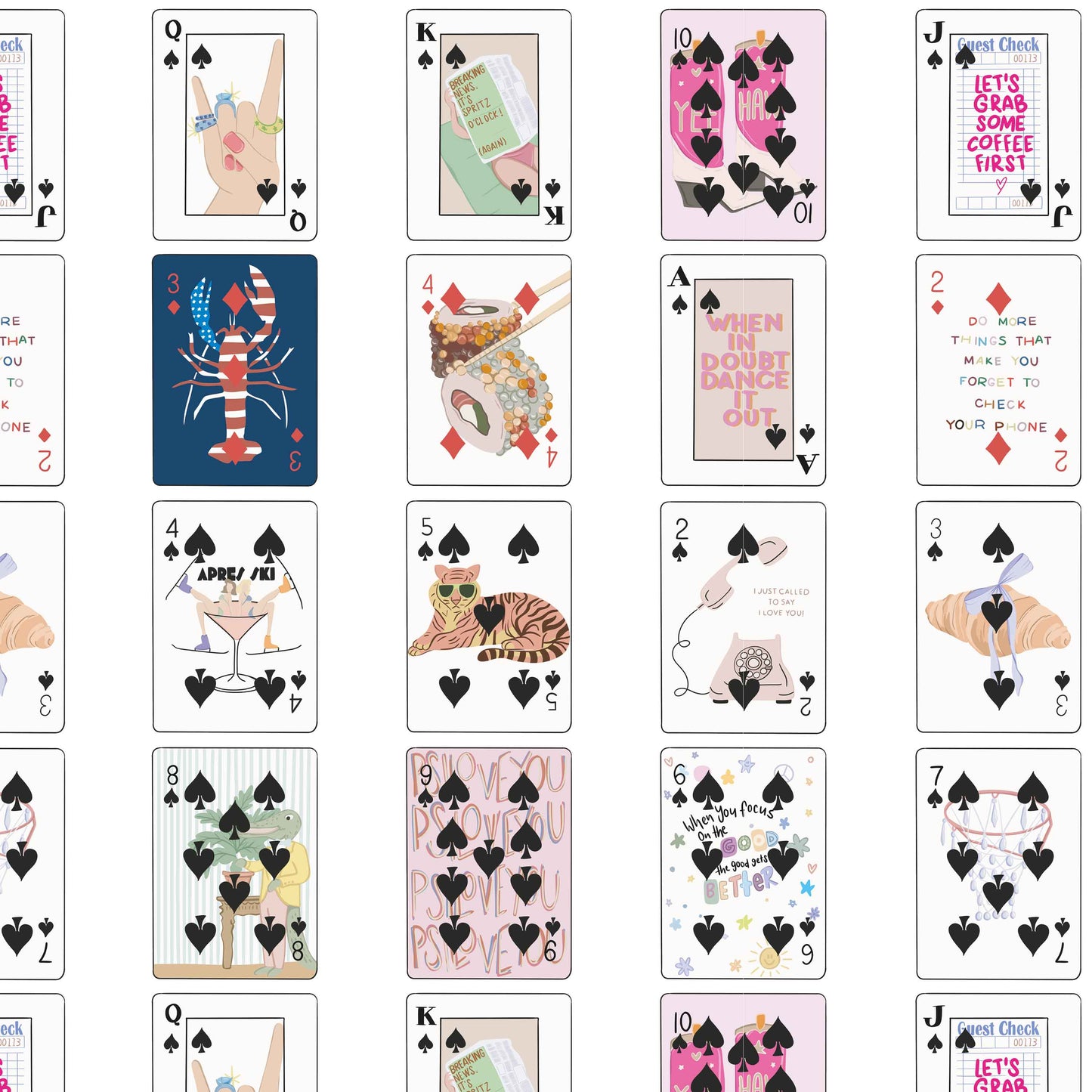 white_Set of playing cards with unique designs and text on each card.