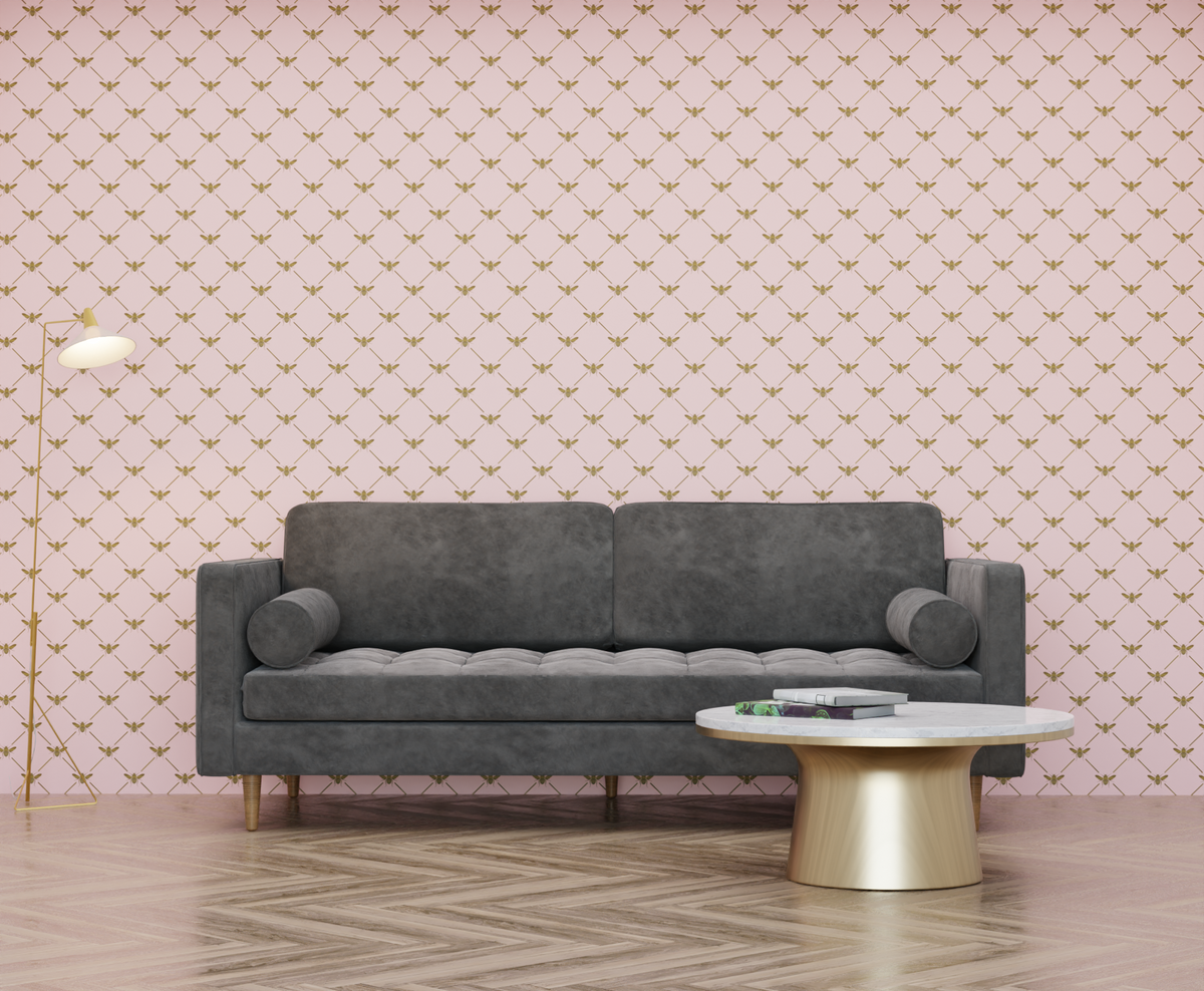 pink_A wallpaper pattern featuring gold bees on a pink background.