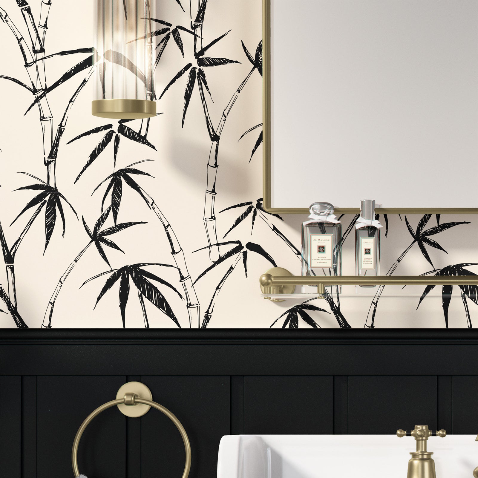 black_traditional wallpaper featuring a sketch of bamboo leaves and stems in black on a cream background in a bathroom