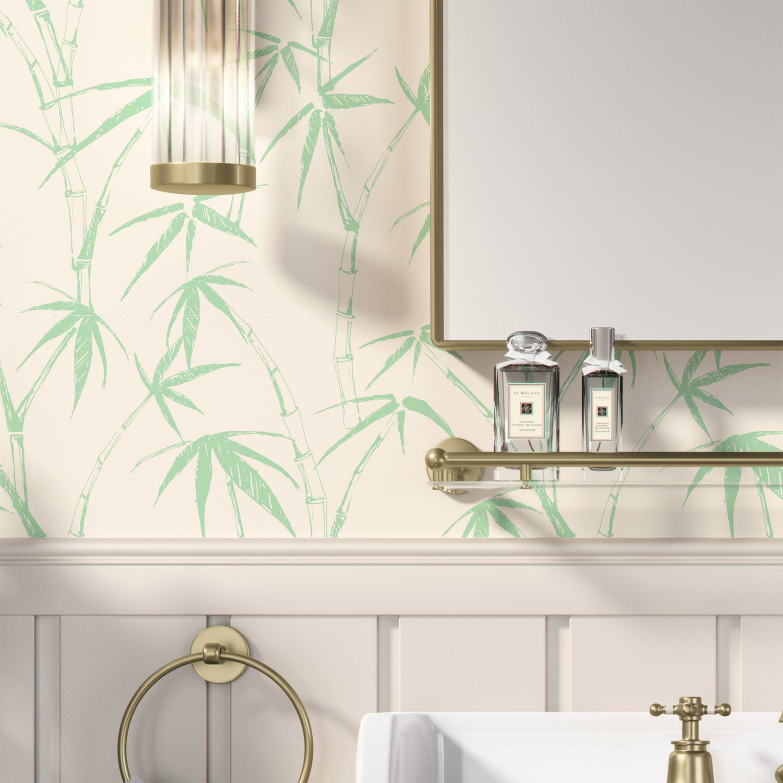 light-green_traditional wallpaper featuring a sketch of bamboo leaves and stems in light green on a cream background in a bathroom