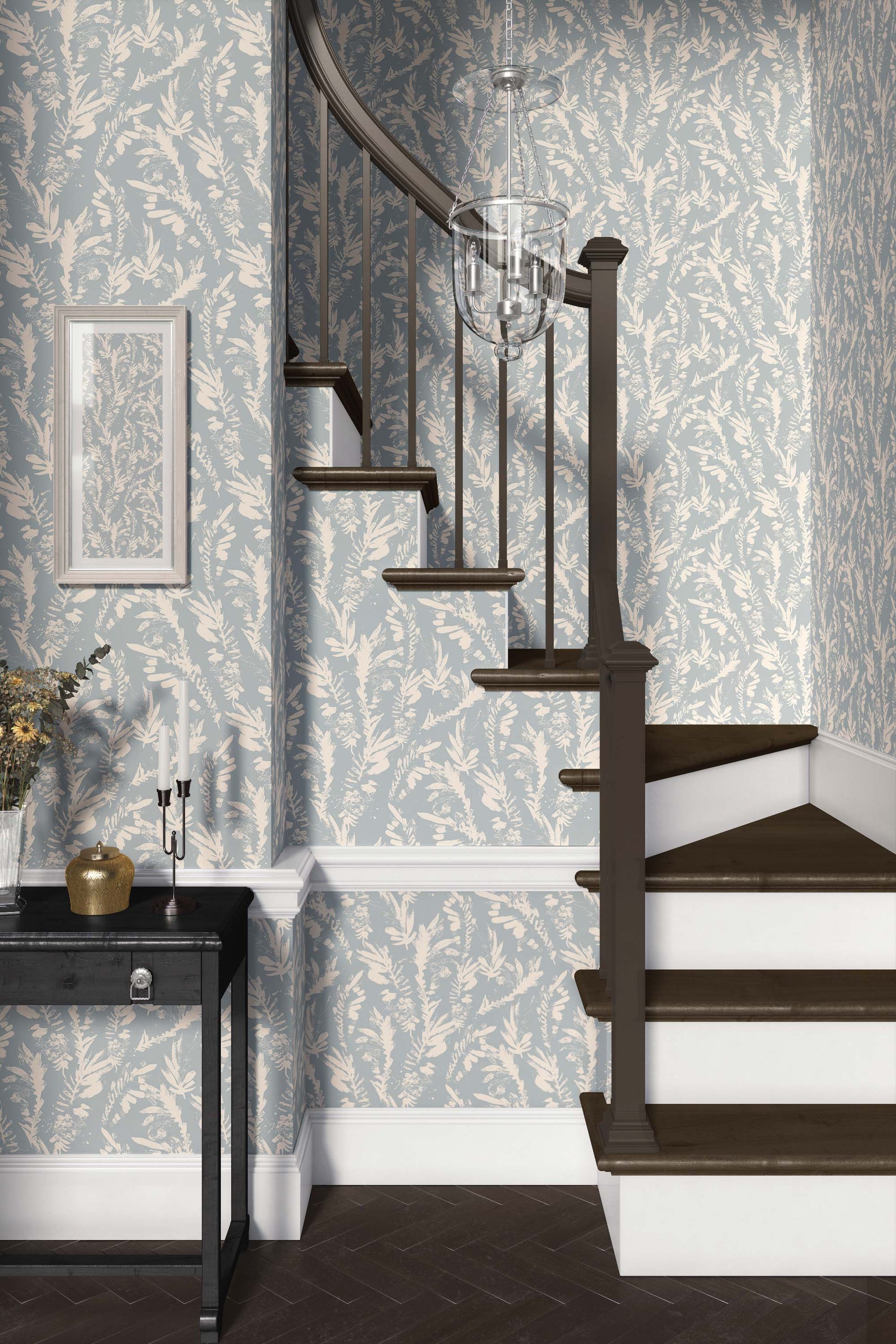 light-blue_A section of floral wallpaper with a pattern of off white wildflowers on a blue background in a foyer with a wooden staircase. 
