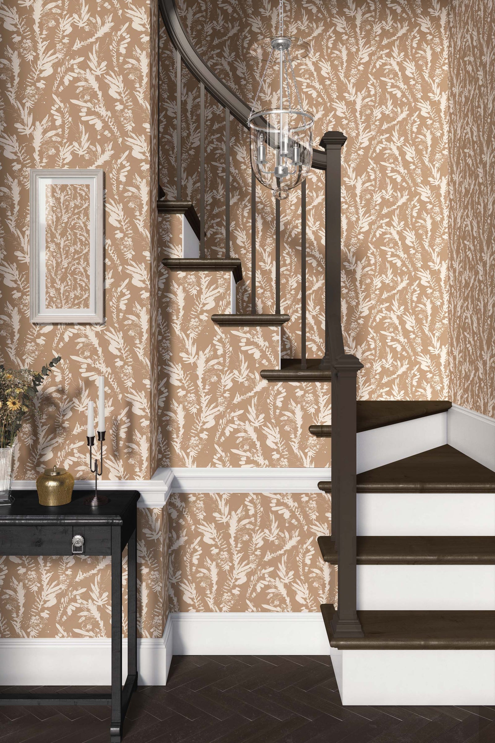 tan_A section of floral wallpaper with a pattern of off white wildflowers on a tan background in a foyer with a wooden staircase. 