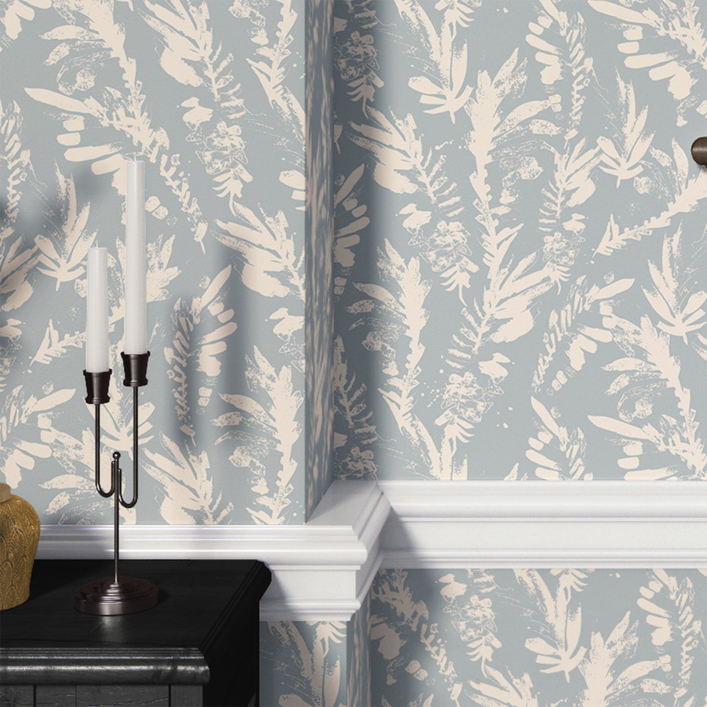 light-blue_A section of floral wallpaper with a pattern of off white wildflowers on a blue background.