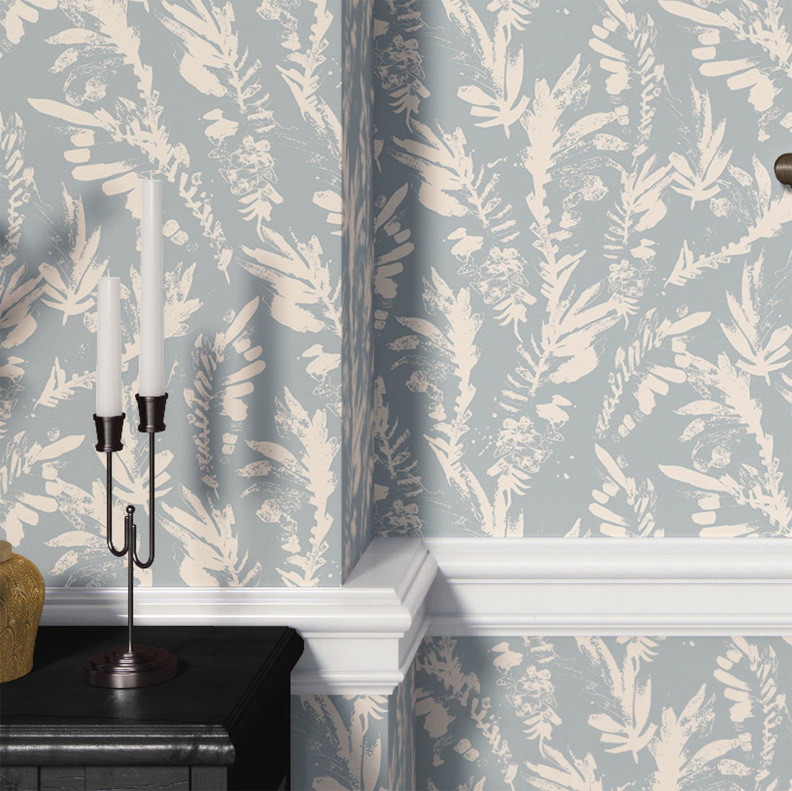 light-blue_A section of floral wallpaper with a pattern of off white wildflowers on a blue background.