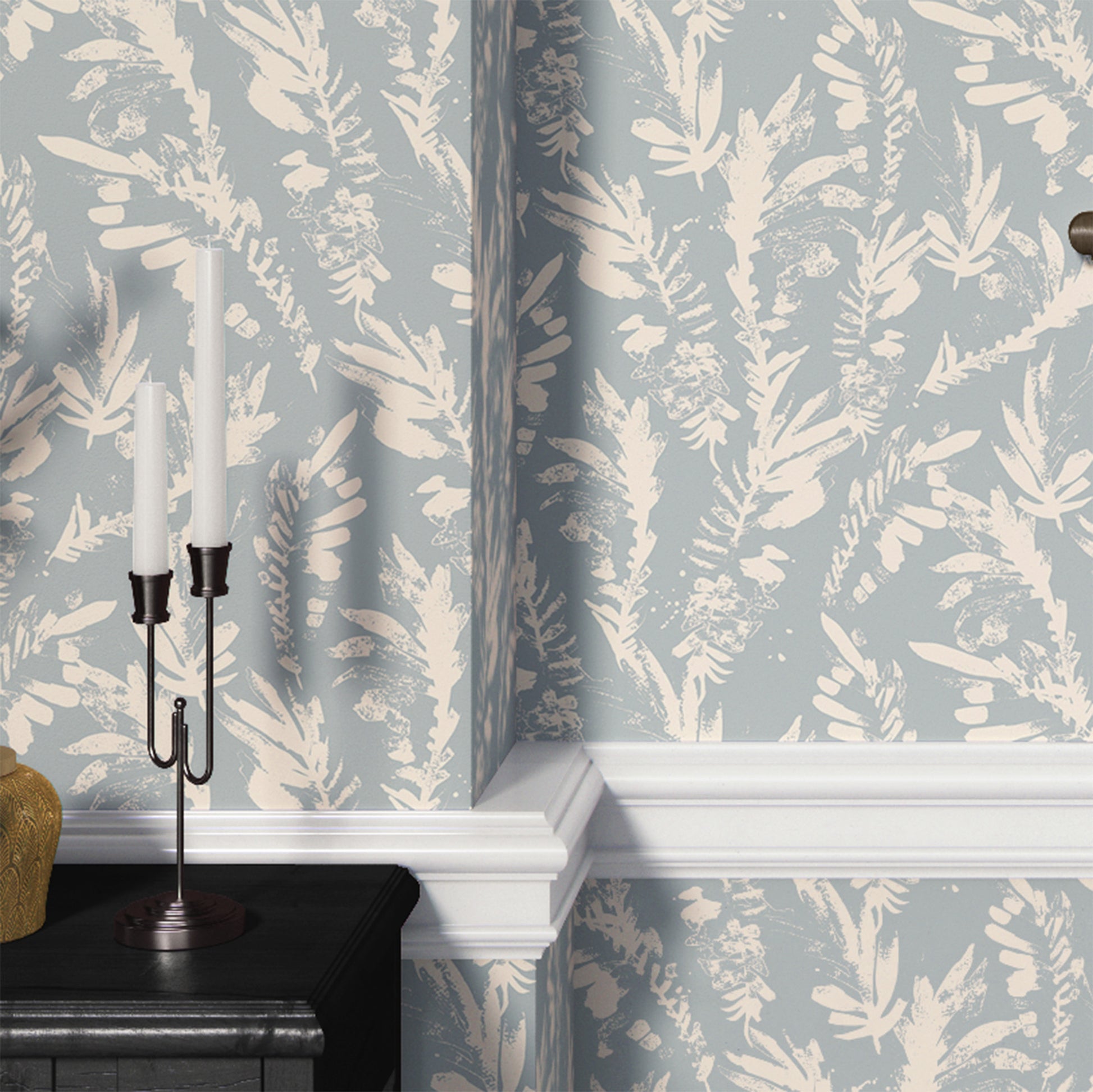 light-blue_A section of floral wallpaper with a pattern of off white wildflowers on a blue background.