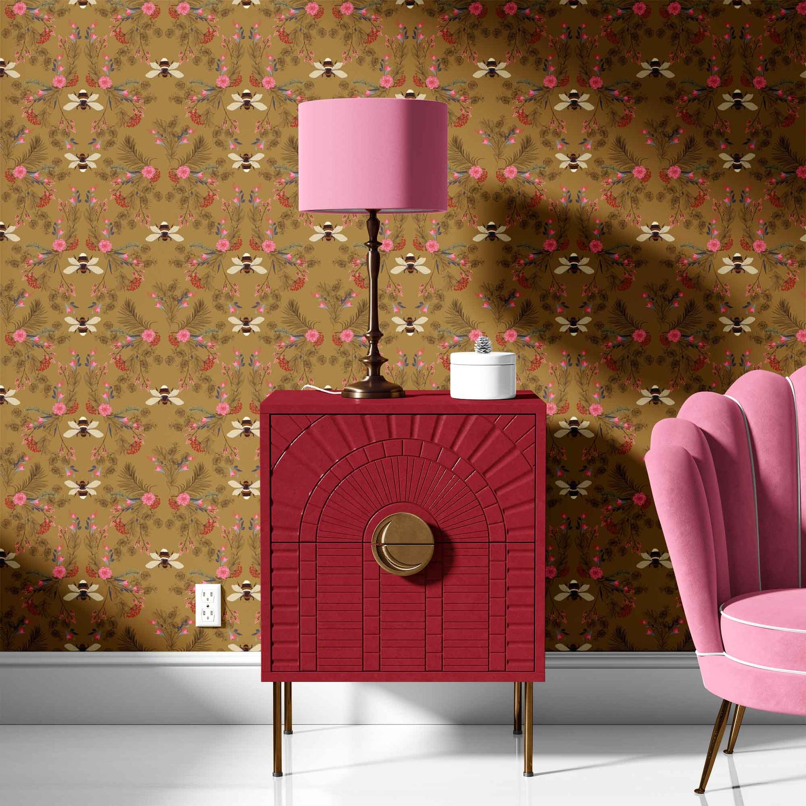 brown_Symmetrical botanical pattern featuring detailed florals, foliage, and berries arranged around illustrated bees, set on a warm ochre background with accents of pink, red, and muted blue for a rich, vintage-inspired look in a room with a pink chair.