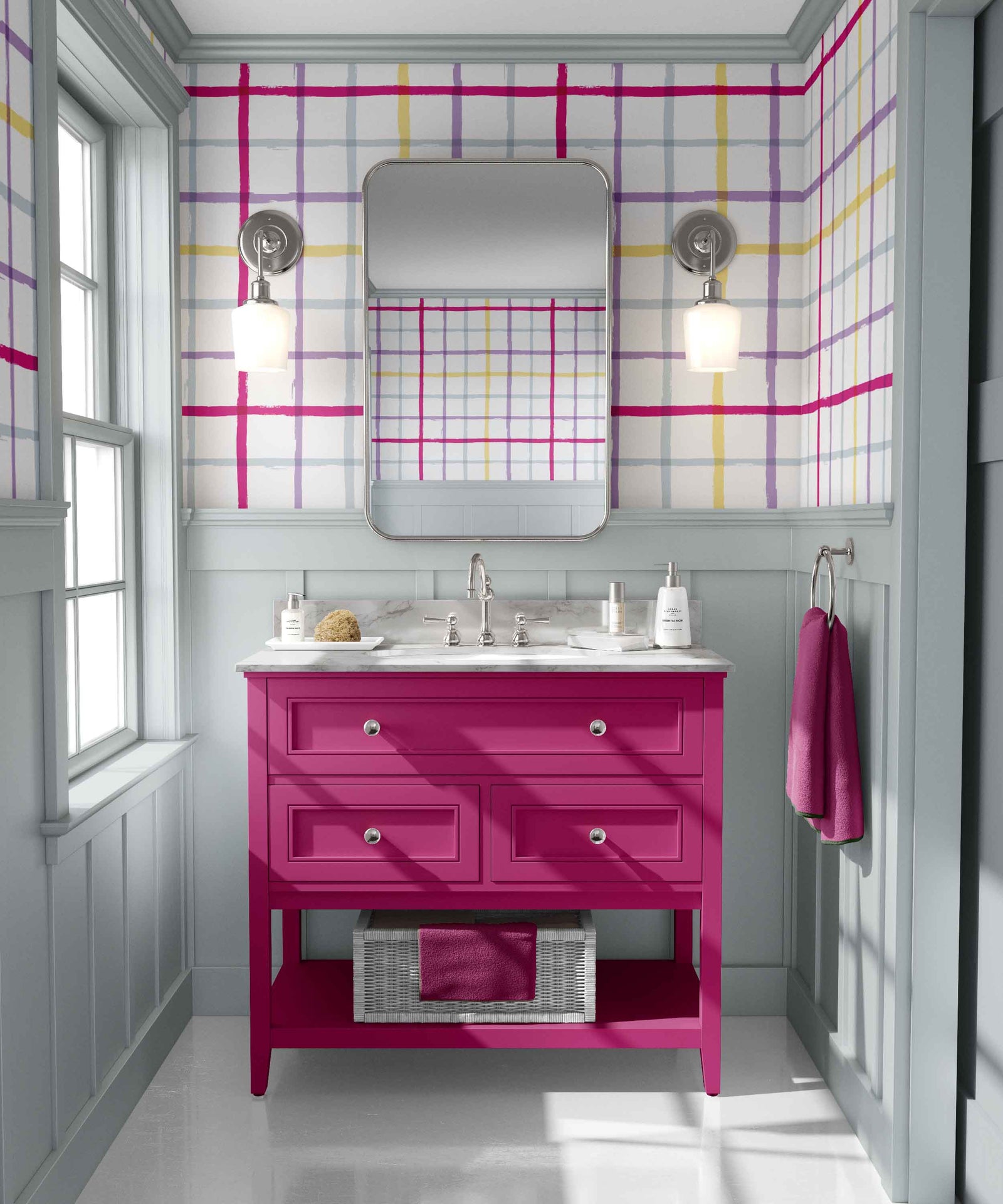 brights_A colorful geometric patterned wallpaper featuring lines in pink, purple, yellow, and blue on a white background in a bathroom.
