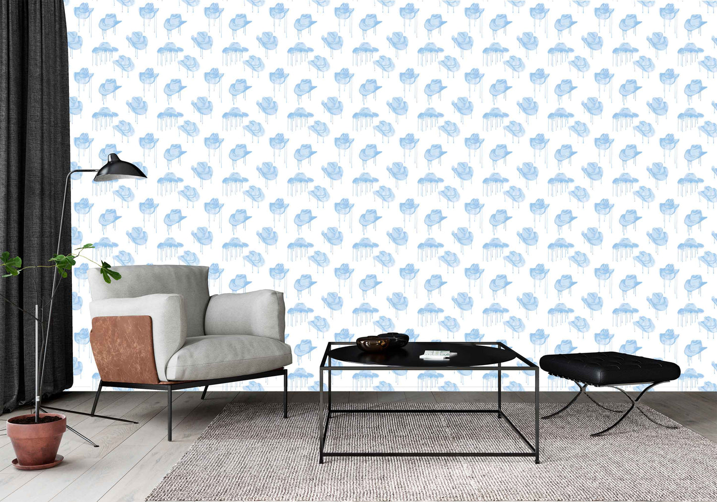 blue_A wallpaper with a pattern of blue cowboy hats with a dripping effect against a white background in a room with a white chair.