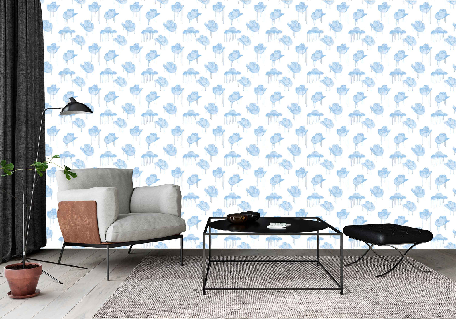 blue_A wallpaper with a pattern of blue cowboy hats with a dripping effect against a white background in a room with a white chair.
