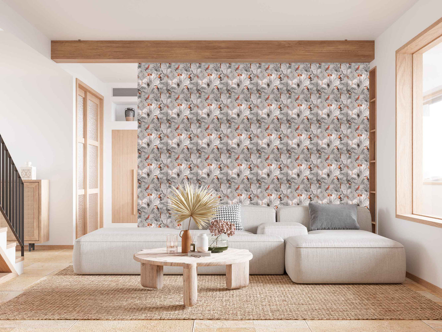taupe_A wallpaper pattern featuring a tropical bird pattern with gray, white, and red colors on a taupe background in a living room with a cream couch.
