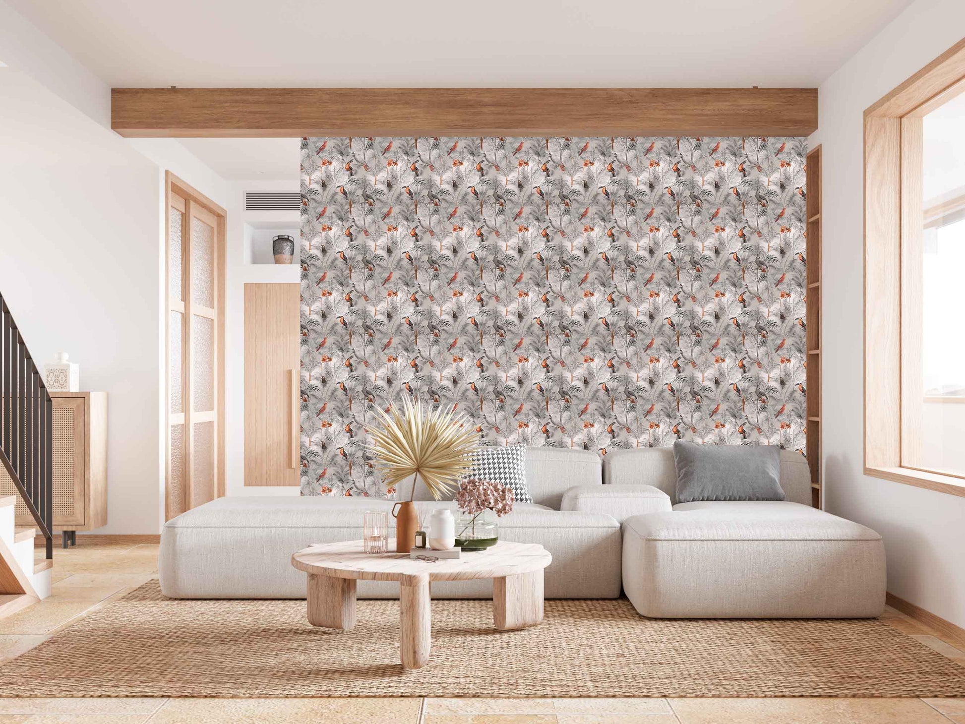 taupe_A wallpaper pattern featuring a tropical bird pattern with gray, white, and red colors on a taupe background in a living room with a cream couch.