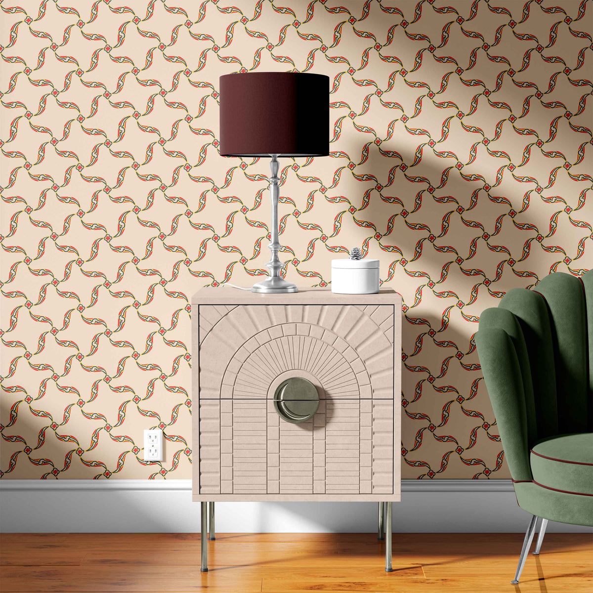 tan_A section of wallpaper with a geometric pattern featuring swirls and floral-like designs, predominantly in orange tones on a tan background in a room with a green chair.