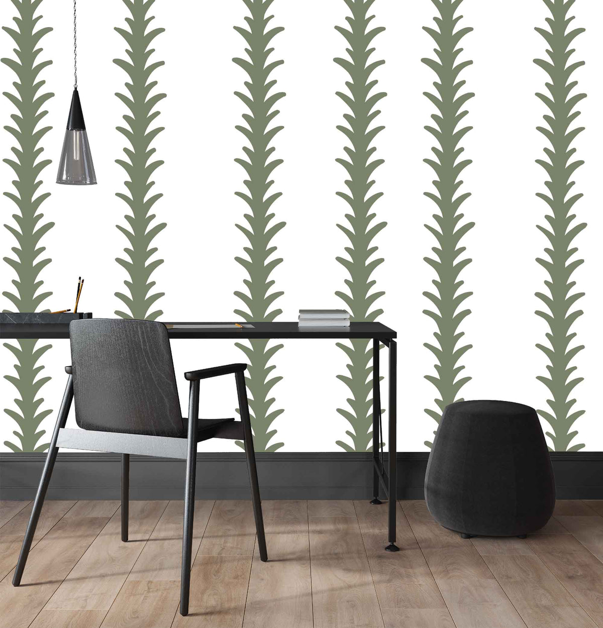 sage_A vertical pattern of leaf-like shapes in shades of sage with a white background, indicative of traditional wallpaper in a room with a desk.