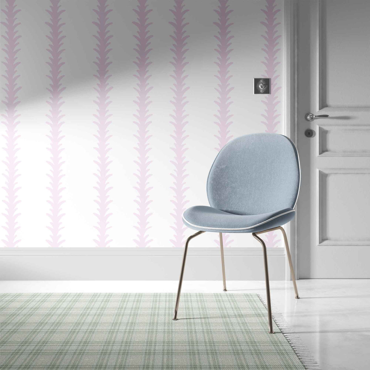 pink_A vertical pattern of leaf-like shapes in shades of pink with a white background, indicative of traditional wallpaper in a room with a blue chair.