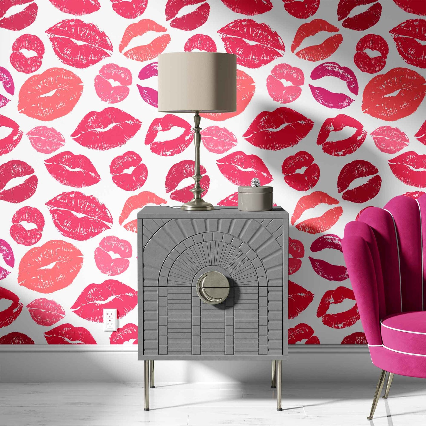 pink_A wallpaper with a repeated pattern of lips in various shades of pink and red on a white background in a sitting room with a pink sofa.